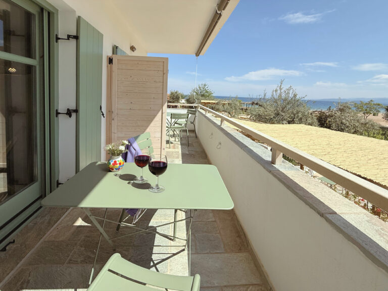 13 balcony with wine and flowers an seaview